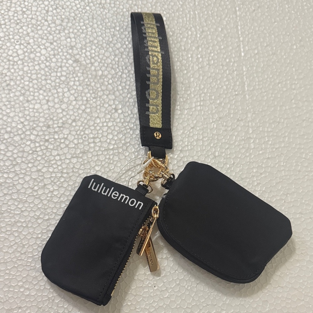 lululemon athletica Black and Gold Wristlet Set